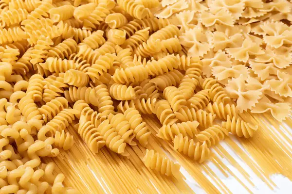 stock image Raw pasta types and shapes of dry Italian pasta.