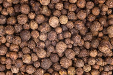 Arka plan olarak karabiber. Kuru karabiber çekirdeği. Üst görünüm.