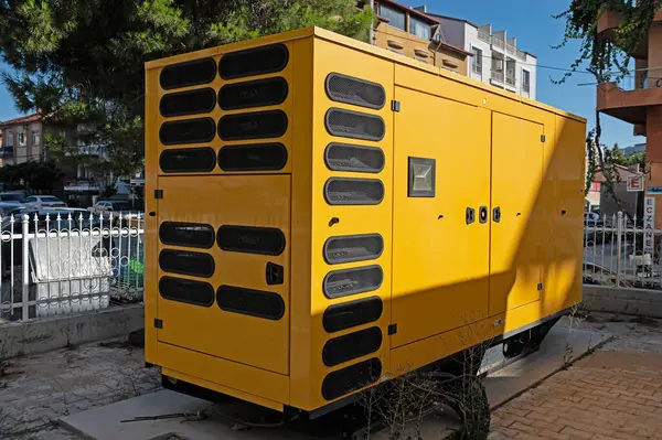 stock image Large generator in yellow colour. Large generator