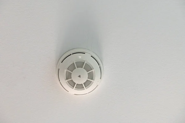 Fire alarm box on the ceiling.