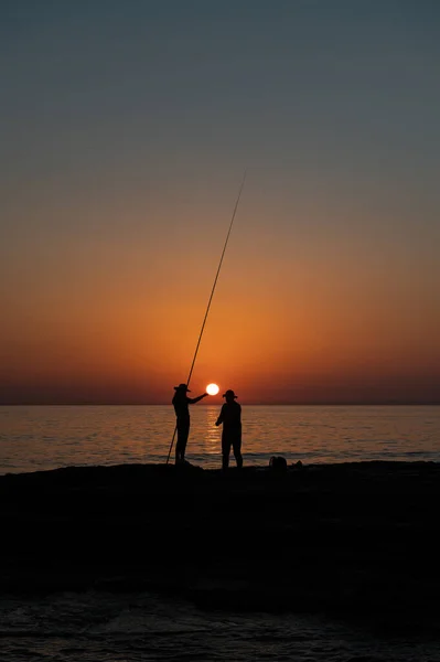 Silhouette Girl Man Fishing Fishing Rod Sea Sunset Stock Image
