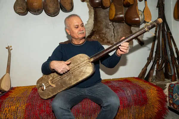 Guembri is a musical instrument typical of Moroccan culture. It is also known as Gimbri, Sintir or Hejhoujis.