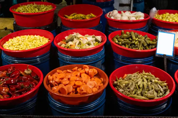 Stock image Different fruit and vegetable pickles at a farmers' market in Turkey.