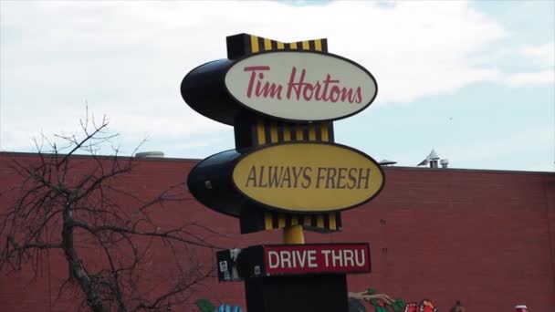 Vintage Tim Hortons Always Fresh Drive Signs Mural Brick Wall — стоковое видео
