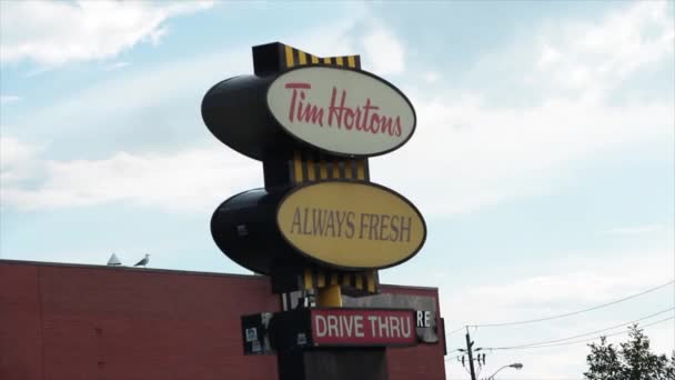 Vintage Tim Hortons Always Fresh Drive Signs Vehicle Traffic Passing — стоковое видео