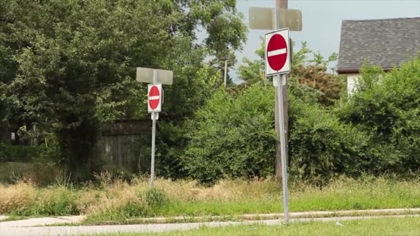 Two Enter Road Street Signs One Foreground Other Background Red — Stock Video