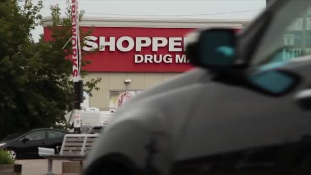 Shoppers Drug Mart Side Building Parking Lot Fireworks Sign Store — Stock Video
