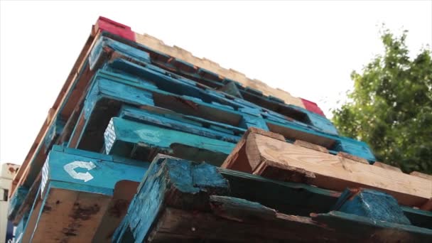 Stack Blue Palettes Skids Top One Another Wood Colored Ones — Stock Video