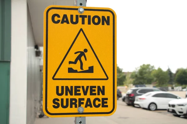 Caution Uneven Surface Sign Caption Illustration Picture Person Walking Uneven — Stock Photo, Image