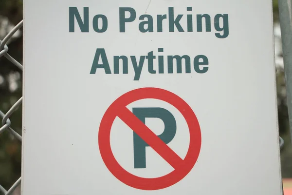 Parking Anytime Sign Capital Crossed Out Fence Close — Stock Photo, Image