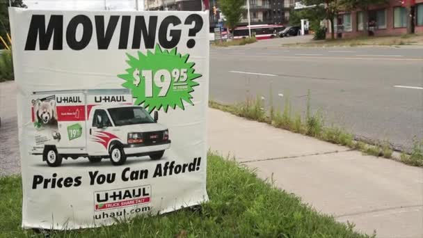 Moving 1995 Dollars Prices You Can Afford Uhaul Sign Grass — Stock Video