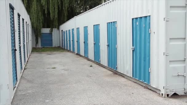 Outdoor Exterior Public Storage White Shipping Container Bins Blue Doors — Stock Video