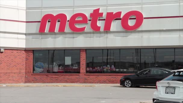 Metro Grocery Store Chain Franchise Front Car Vehicle Turning Passing — Stock Video