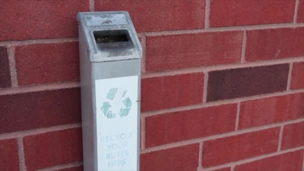 Plastic Long Vertical Gray Ashtray Mounted Brick Wall Says Recycle — Stock Video