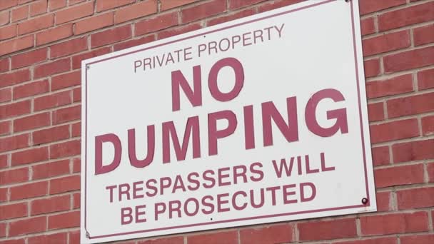 Private Property Dumping Trespassers Prosecuted Horizontal Rectangle Sign Brick Wall — Stock Video