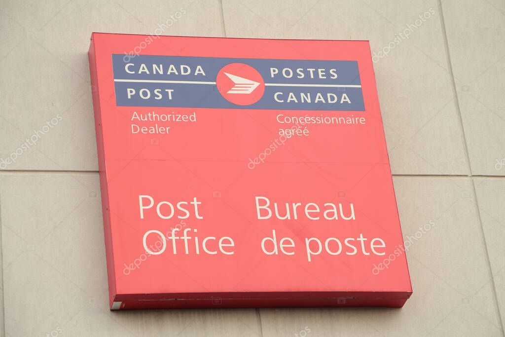 Canada post authorized dealer post office square sign mounted on wall, red blue white
