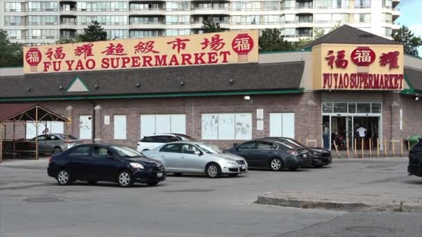 Yao Supermercado Chino Asiático Tienda Comestibles Entrada Frontal Con Estacionamiento — Vídeo de stock