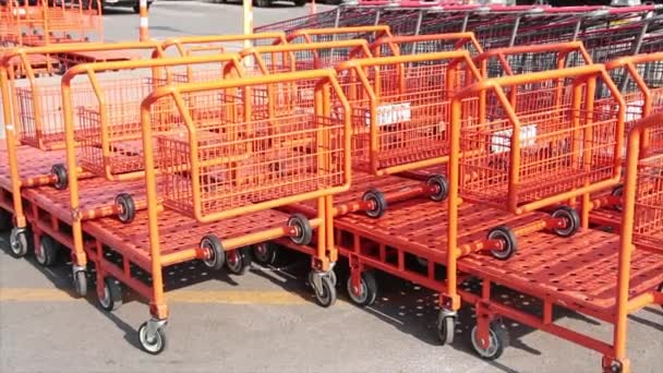 Orange Flatbed Shopping Carts Buggies Dollies Trollies Each Other Summer — Stock Video