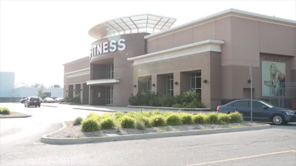 Gym Large Building Says Fitness Its Front Summer Exterior Cars — Stock Video