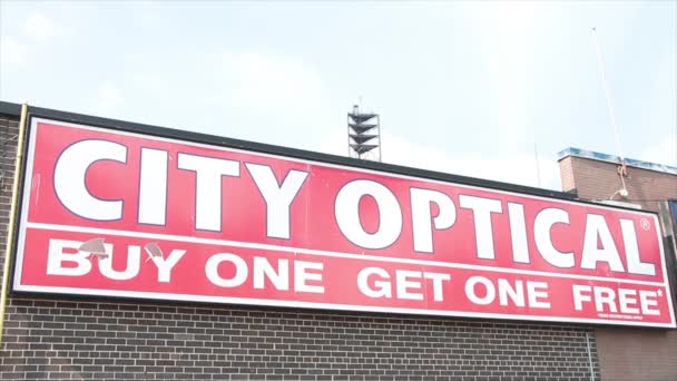 City Optical Buy One Get One Free Logo Sign Store — Stockvideo