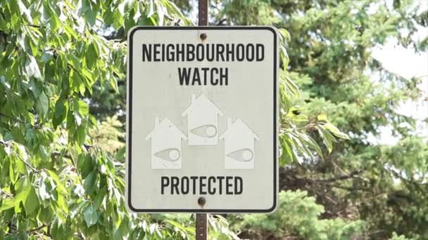 Neighbourhood Watch Protected Writing Caption Text Rectangle Sign Post Blowing — Stock Video