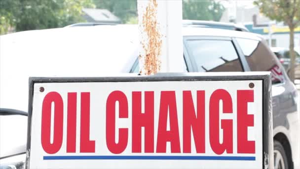 Oil Change Sign Writing Caption Text Exterior Red White Bright — Stock Video