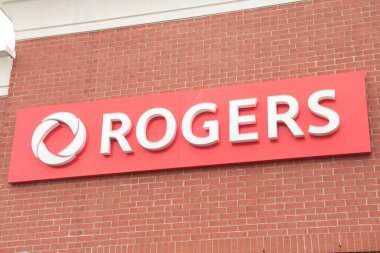 Roger Kablolu İnternet markası Kanada Logosu Tuğla duvarda kırmızı ve beyaz