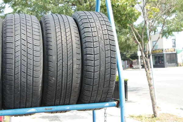 Three Used Tires Side Side Blue Rack Exterior Bright Days — Stock Photo, Image