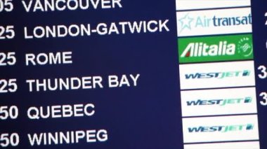 Kanadalıların ve diğer şehirlerin uçuş zamanları TV 'de. Havaalanındaki Westjet alitalia calgary vancouver london rome thunder bay quebec winnipeg wintral ottawa uçuş numarası ve zamanı, kapatın.