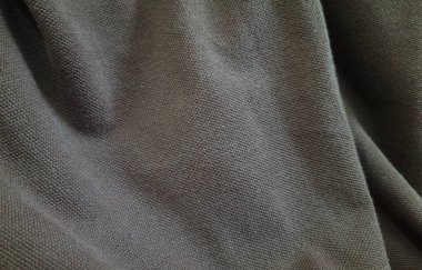 Doğal pamuk ya da keten kumaş dokusu. Doğal bej ya da kahverengi kumaşın yakın çekim dokusu. Bej tuval arkaplanı.