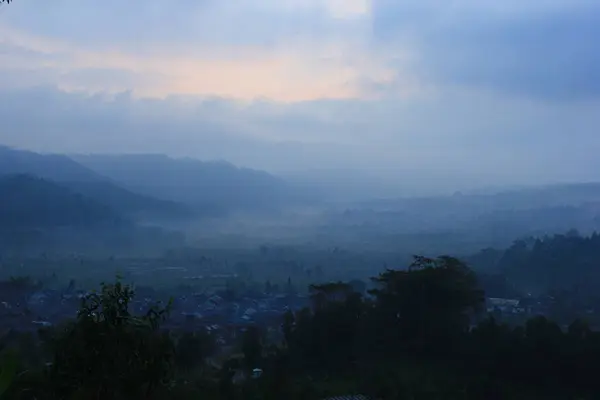 stock image morning sunrise in morning mist. the sunrise in the mountains.