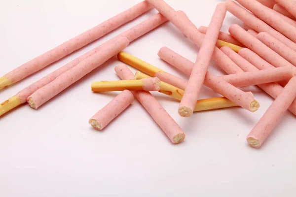 白い背景にピンクの砂糖 — ストック写真