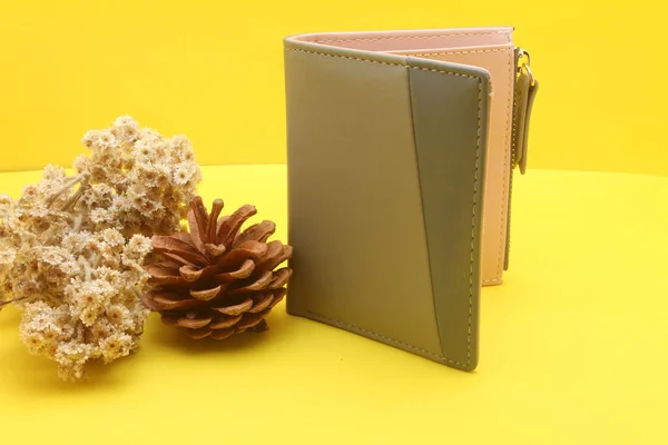 notebook on white background with yellow cover