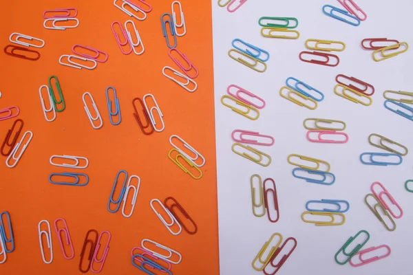 colored paper clips isolated on a white background.