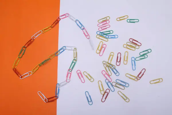 colorful paper clips and colored paper clips