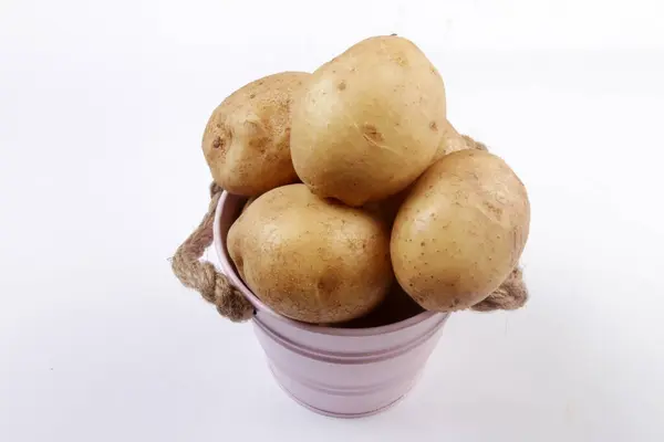 Cartofi Castron Fundal Alb — Fotografie, imagine de stoc