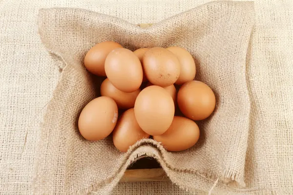 Bruine Eieren Verpakking Houten Ondergrond — Stockfoto