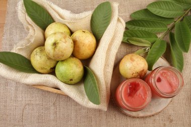 ripe guava on table clipart