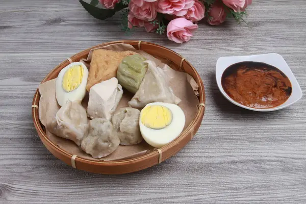 Indonesian food : siomay on bamboo plate.