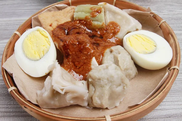 Indonesian food : siomay on bamboo plate.