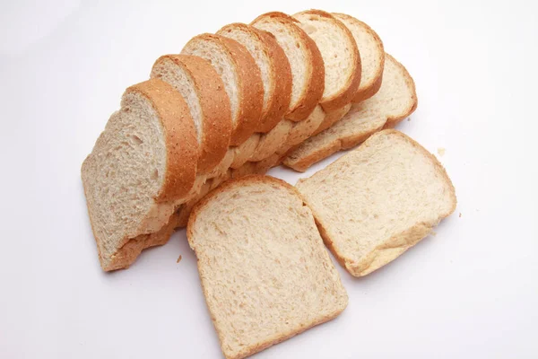 Krájený Chleba Dřevěném Pozadí — Stock fotografie