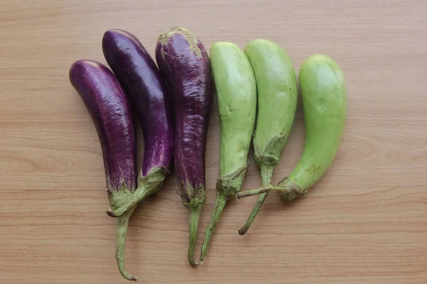 purple and green beans, purple eggplant