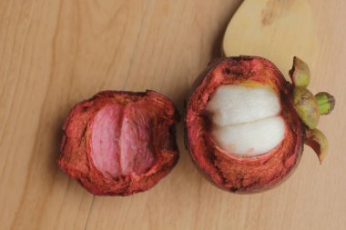 fresh mangosteen on wooden table