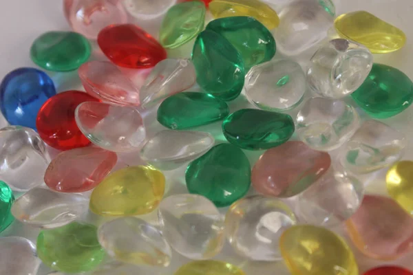 stock image picture of colorful beads of gem toys with close up compotitions