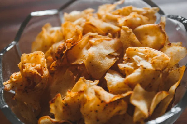 stock image close up hot cassava chips on glass bowl, food macro photography