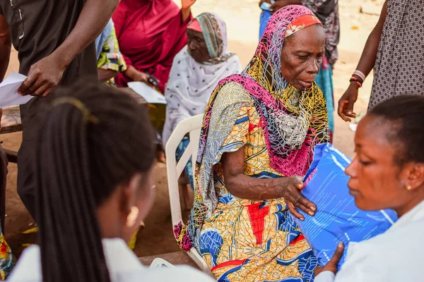 stock image Abuja, Nigeria - July 26, 2021: Community Sensitization on Covid 19, Health and Water Hygiene of Indigenous Africa Villages. Election Campaign Meeting. Cancer Awareness Program and Empowerment