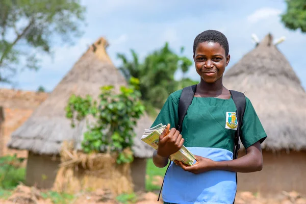 stock image Abuja, Nigeria - June 12, 2023: African Children Young Students Learning in a Rural Community. Smiling African Children Wearing School Uniform. Education in African.