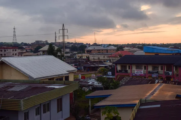 stock image Jos East, Plateau State, Nigeria - September 12, 2021: dramatic view of African village at sunset 