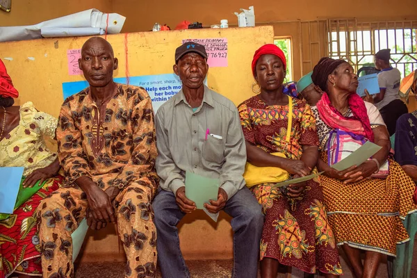 stock image Aluu, Port Harcourt, Nigeria - August 10, 2021: African People Waiting on a Queue for Medical Care and Attention in a Rural Community