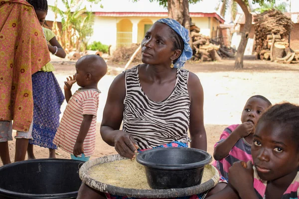 stock image Karara, Nasarawa State - May 5, 2021: African Mother and Children Working Together